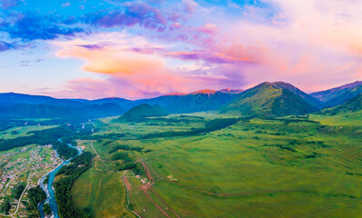Fototapeta na wymiar Beautiful Hemu Village with natural scenery in Xinjiang,green mountain and forest with rivers.Hemu Village is a famous travel destination in China.Aerial view.
