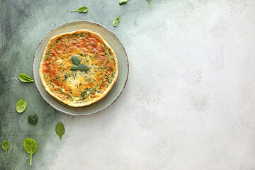 Spinach tart on color background