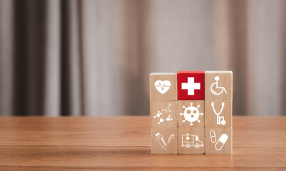 Red wood block of  plus sign on icon wooden arrangement. Healthcare and Medical concept. Insurance good heath. Patient beware virus. hospital treatment. Family Safety. Medicine protect. virus problem.