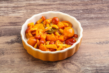 Marinated pickled honey mushrooms in the bowl
