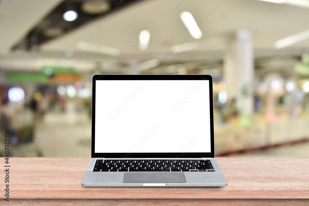 Canvas Prints laptop computer with blank screen on wood table over blur shopping mall background. mock up, templat