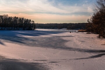 sunset in the winter snow tegel see