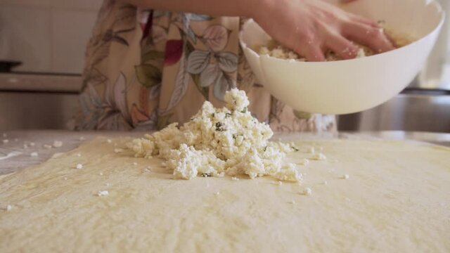 homemade cheese roll. buns with cottage cheese. mixing ingredients