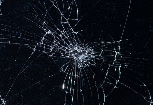 Texture broken glass with cracks on a white background