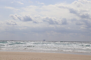 Fototapeta na wymiar Sea, sky, beach and ship.