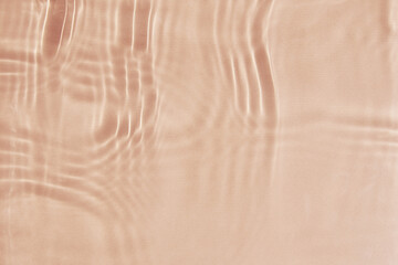 Beige water surface background. Water texture with splashes and bubbles. Summer nature background