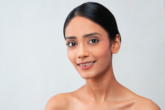 Portrait of a young woman with clear,spotless skin.