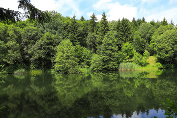 View to basalt lake (Basaltsee) in Rhoen mountains, Germany