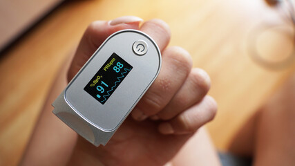 Low blood oxygen levels. A dangerous indicator for hypoxia. Measurement of oxygen saturation with a...