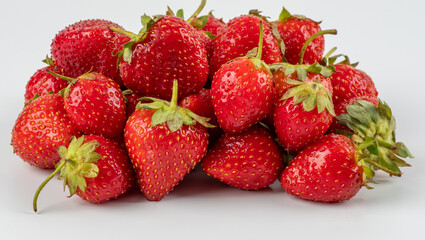 Fresh, red and tasty strawberries isolated on a white background