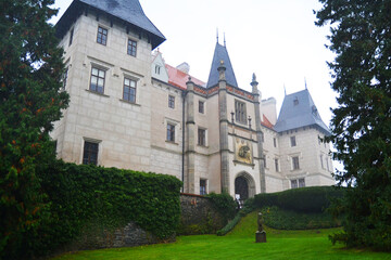 Fototapeta na wymiar Medieval Žleby castle (Zámek Žleby) on rainy autumn day. Žleby, The Central Bohemian Region, Czech Republic