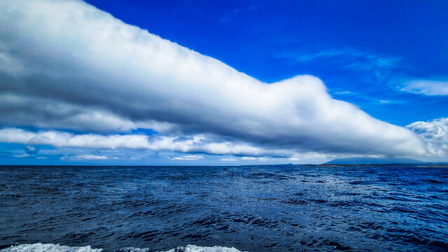 Large cigar cloud rolling in off the coast at Narooma, New South Wales, Australia