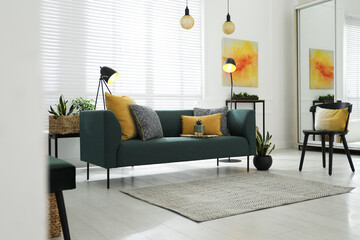 Modern living room interior with stylish comfortable sofa