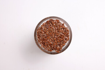 Flex seed flaxseed closeup in small glass jar bottle