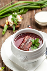 Borsch, soup, beet broth with vegetables and ribs, Traditional Ukrainian cuisine, Restaurant menu, cookbook recipe
