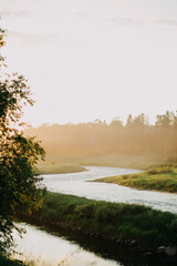 Fototapeta na wymiar sunset on the river in Russia