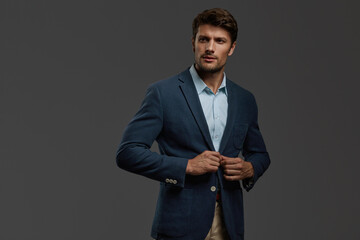 Portrait of young focused european business man