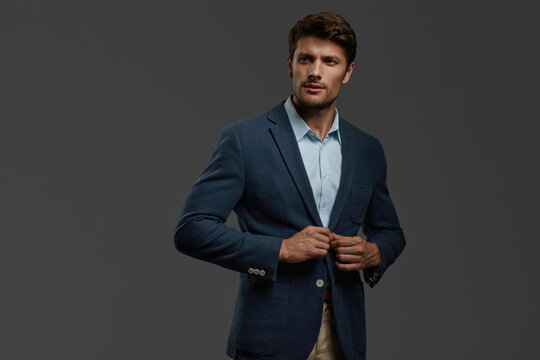 Portrait of young focused european business man