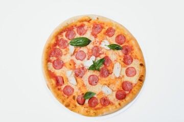 Mixed pizza from top isolated on white background clipping path included.