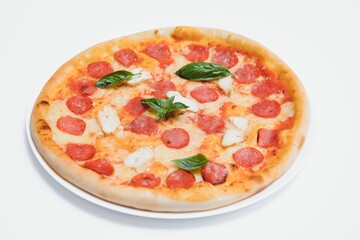 Mixed pizza from top isolated on white background clipping path included.