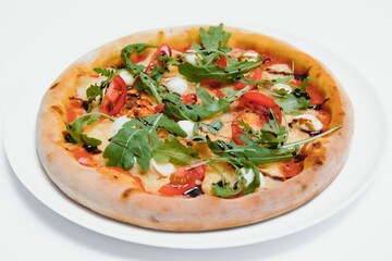 Delicious italian pizza over white background top view