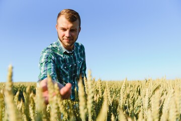 Portrait of a young handsome biologist or agronomist.