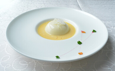chilled mango pudding with mango puree soup dessert in white background asian halal menu