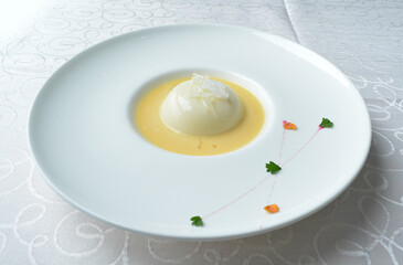 chilled mango pudding with mango puree soup dessert in white background asian halal menu