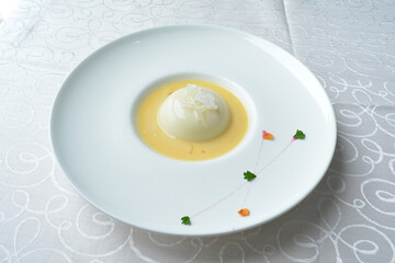 chilled mango pudding with mango puree soup dessert in white background asian halal menu