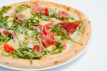 Delicious italian pizza over white background top view