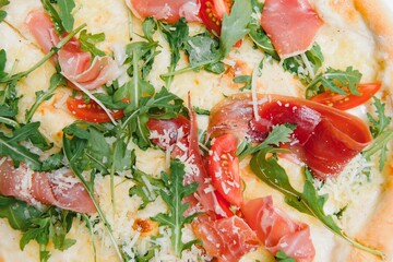 Delicious italian pizza over white background top view
