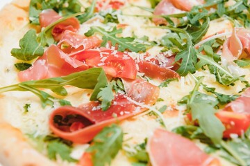 Mixed pizza from top isolated on white background clipping path included.