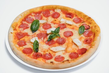 Delicious italian pizza over white background top view