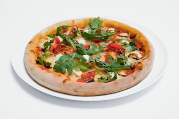 Mixed pizza from top isolated on white background clipping path included.