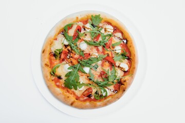 Mixed pizza from top isolated on white background clipping path included.