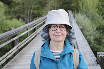 Senior hiker relaxing in nature