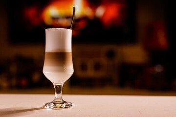 Close-up of fresh latte machiato or cappuccino. Multi layered coffee