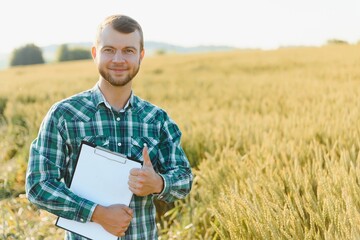 Portrait of a young handsome biologist or agronomist.