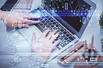 Double exposure of woman hands working on computer and data theme hologram drawing. Tech concept.