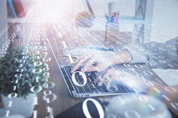 Obraz premium Double exposure of woman hands working on computer and data theme hologram drawing. Tech concept.