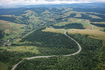 Aerial view on mountain road from drone