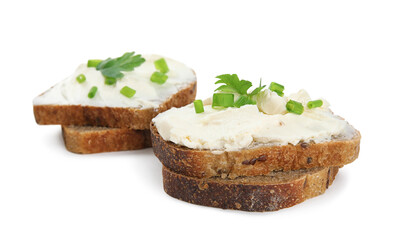 Bread with cream cheese, green onion and parsley on white background