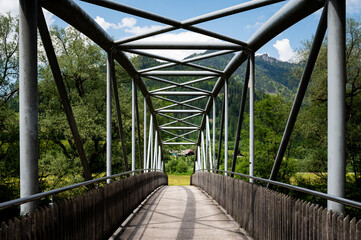 Fototapeta na wymiar Small bridge across river Enns near Admont
