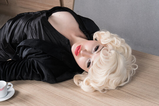 Crime scene with strangled pretty business woman in office..
