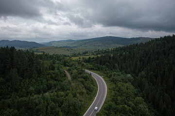 Aerial view on mountain road from drone