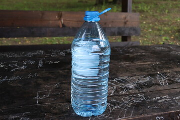 huge bottle of water in plastic container © Mikalai Drazdou