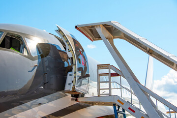 Close up view of the gangway and the entrance to the plane.