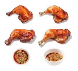 Thai style grilled chicken with chili sauce in ceramic cup on white background