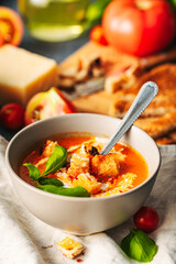 Tomato soup. Tomato creme with basil and bread.  Bowl with italian tomato soup. 