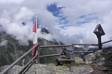 Fototapeta premium explorer of mountain alpine beauty at the level of the clouds, fresh air cloudscape - valley Mont Blanc